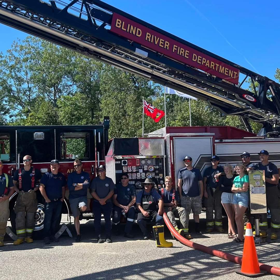 Blind River Fire Department ladder truck and firefighters